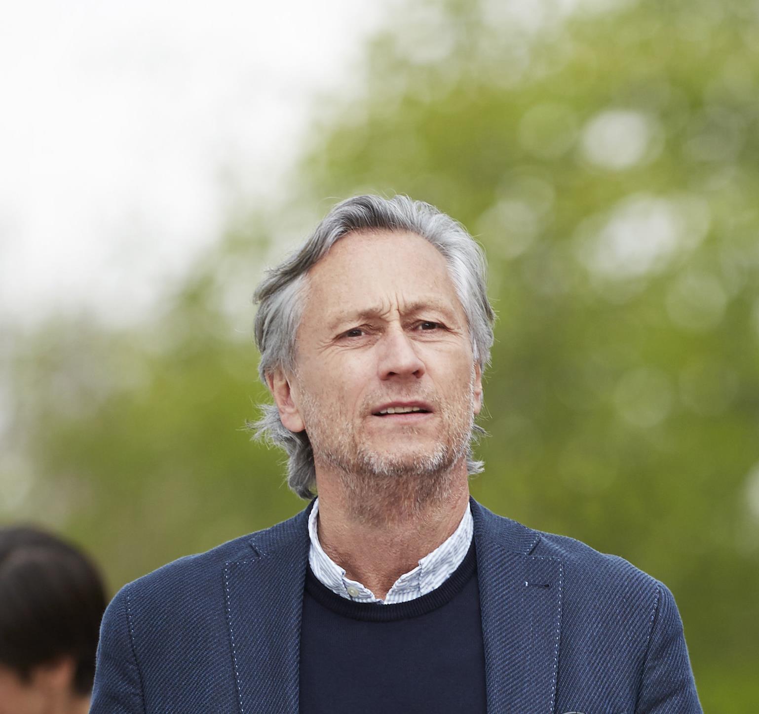 Man concerned about symptoms of hearing loss.