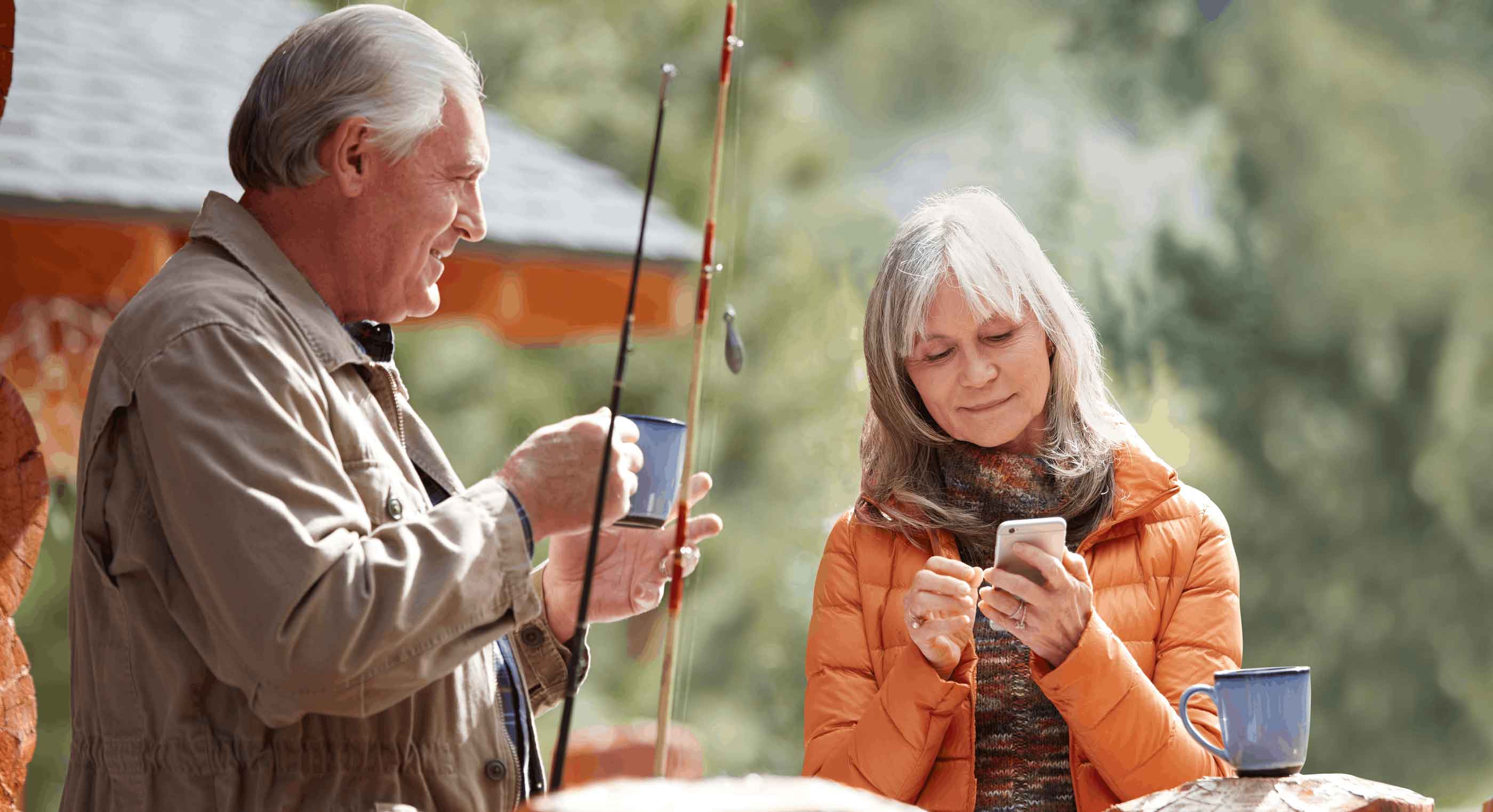 lady adjusting hearing aid settings from phone