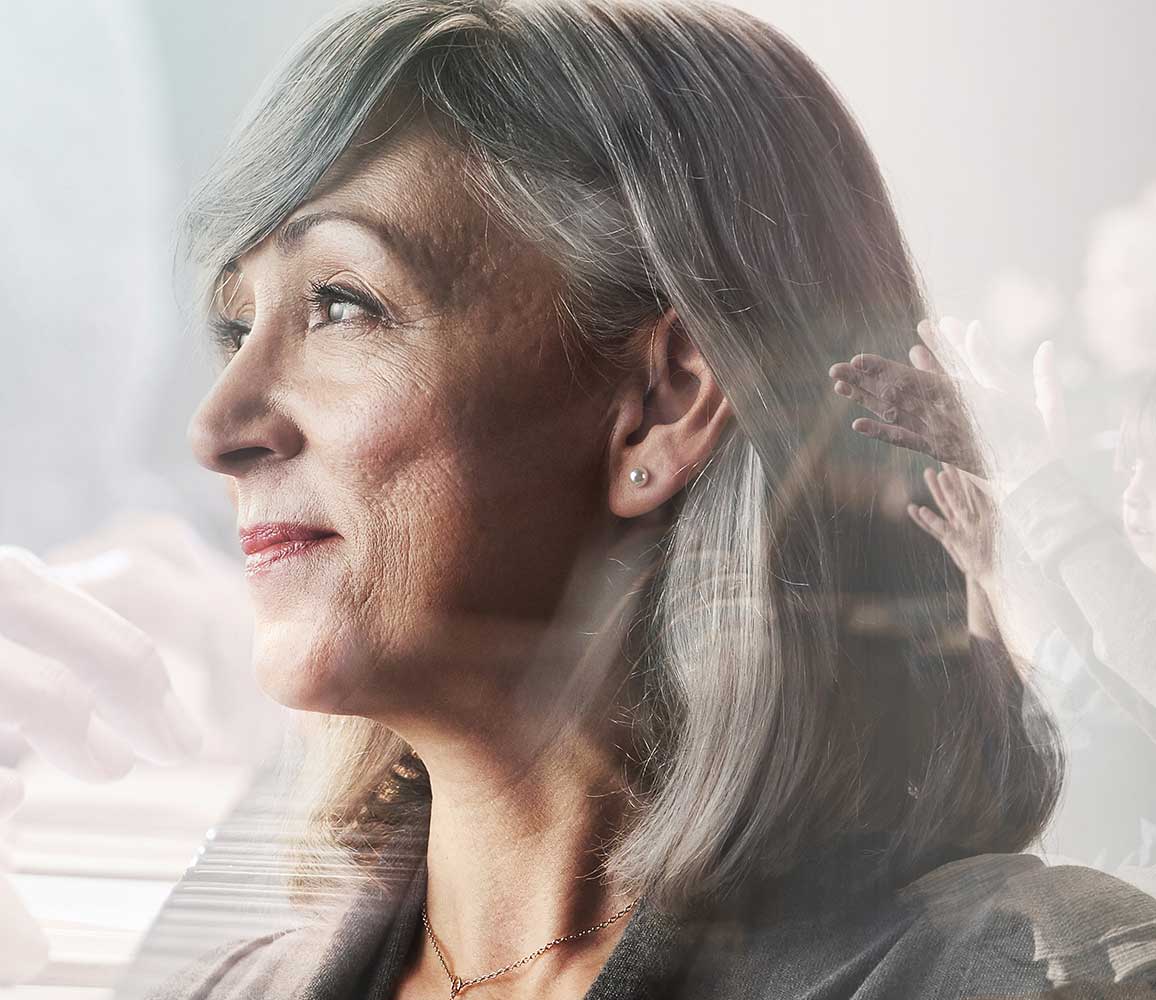 Lady enjoying music show using ReSound LiNX Quattro rechargeable